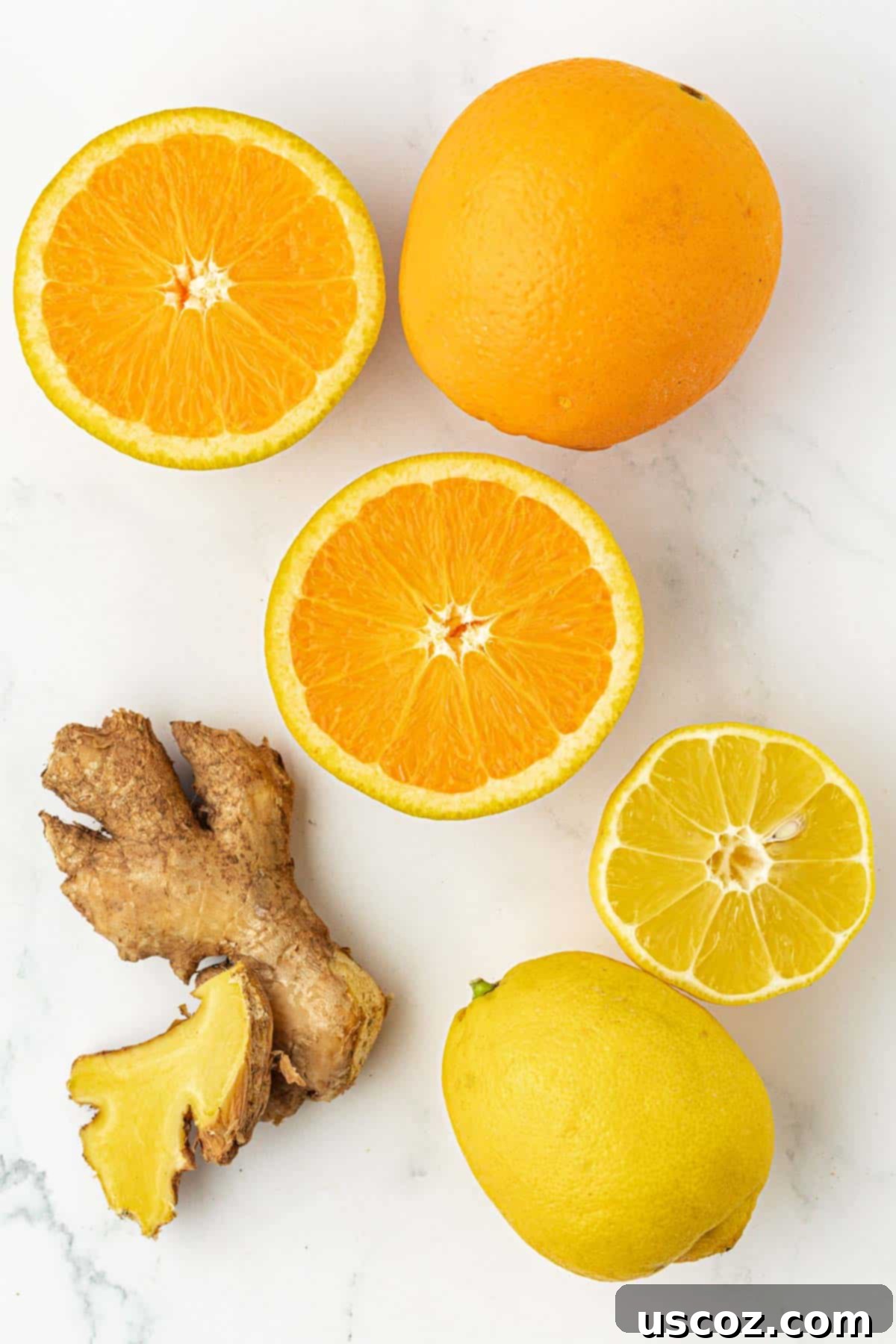 Immune Boost Shots 4 A hand holding a peeled and quartered orange, ready for juicing.