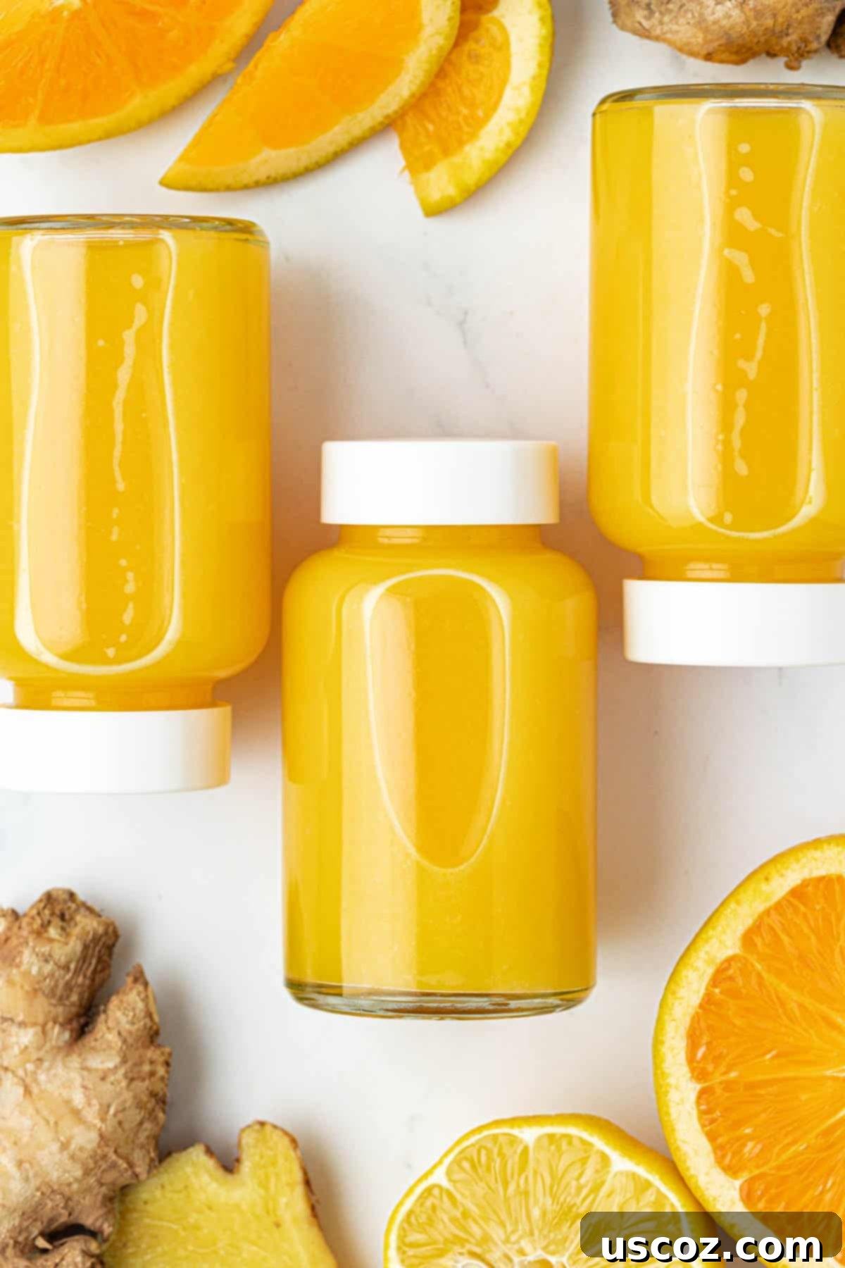 Immune Boost Shots 9 Various small jars of different fresh juices including green, orange, and red colors, showcasing a healthy lifestyle.