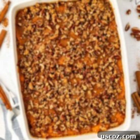 Golden Sweet Potato & Pecan Delight 16 sweet potato casserole with pecans in a baking dish