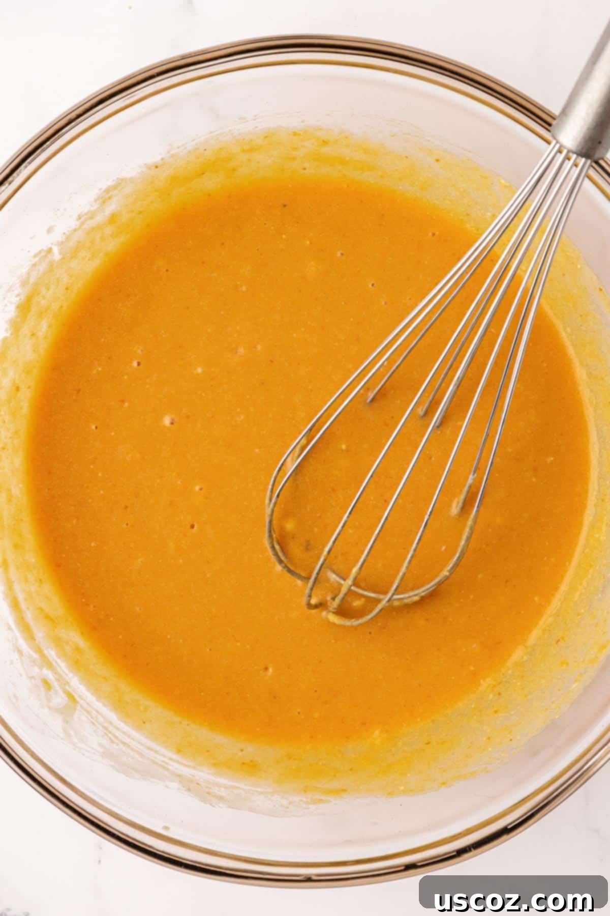Spiced Pumpkin Chocolate Chip Muffins 8 whisking the wet ingredients together