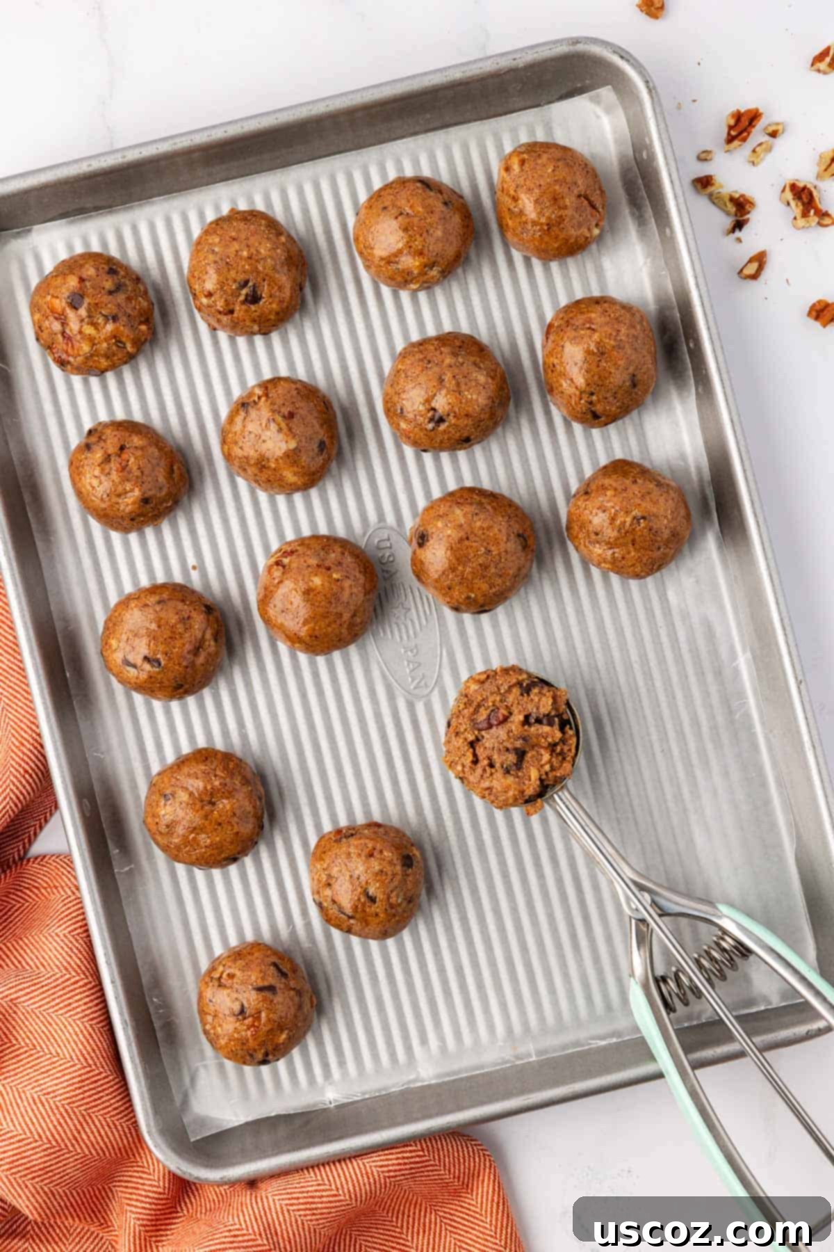 Pecan Pie Power Bites 8 scooping batter onto a baking sheet lined with wax paper