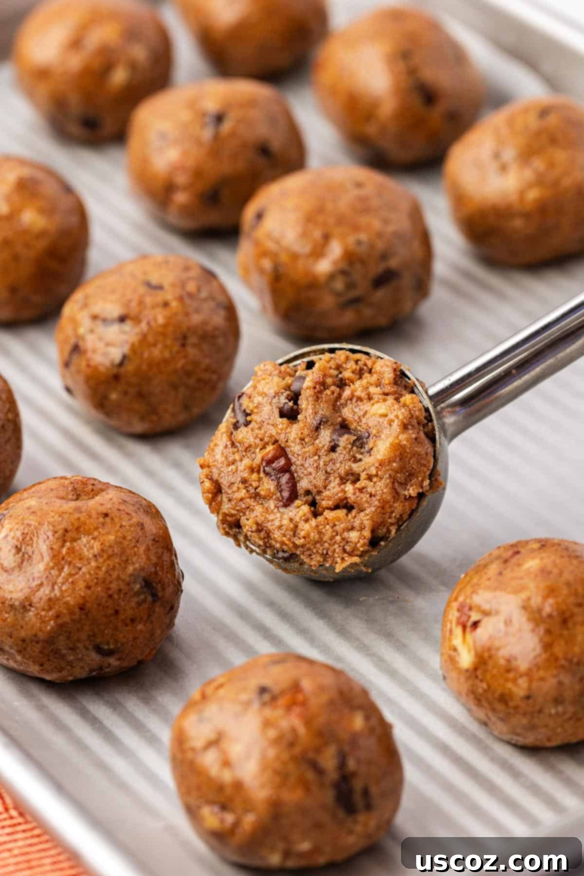 Pecan Pie Power Bites 9 mini cookie scoop filled with batter before rolling