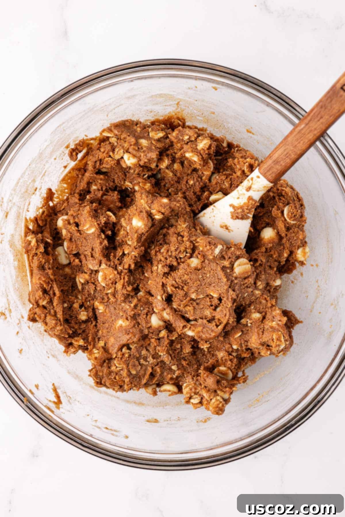 Gingerbread Fuel Bites 6 energy bite batter mixed together in a bowl with a rubber spatula