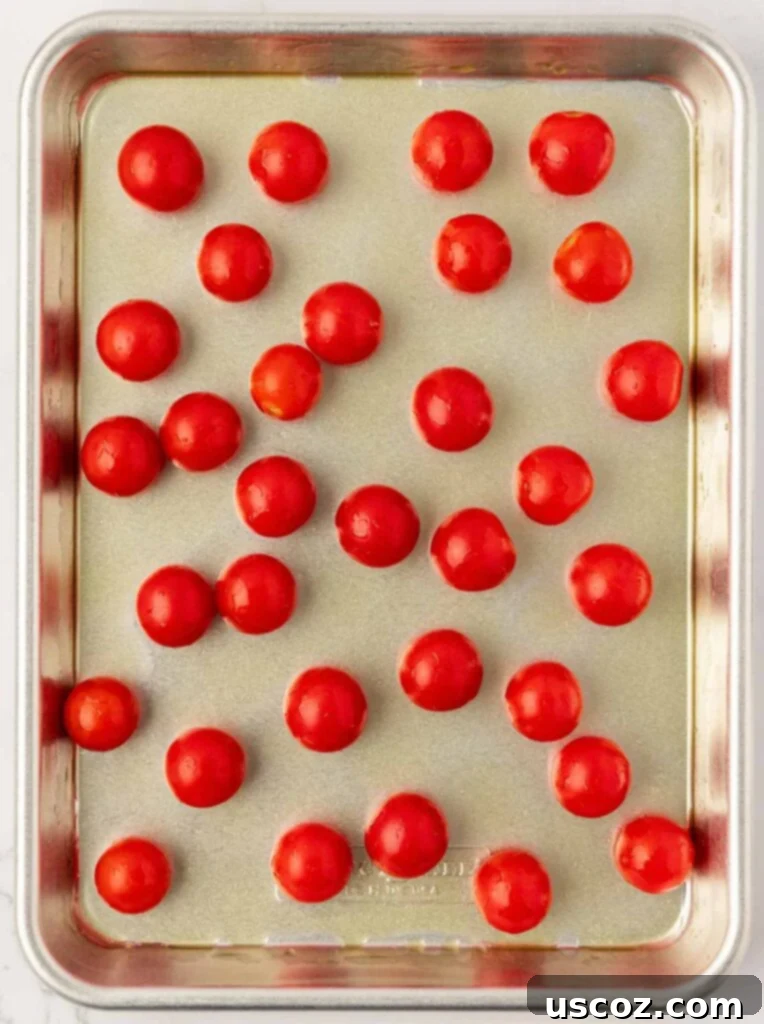 cherry tomatoes on a baking sheet