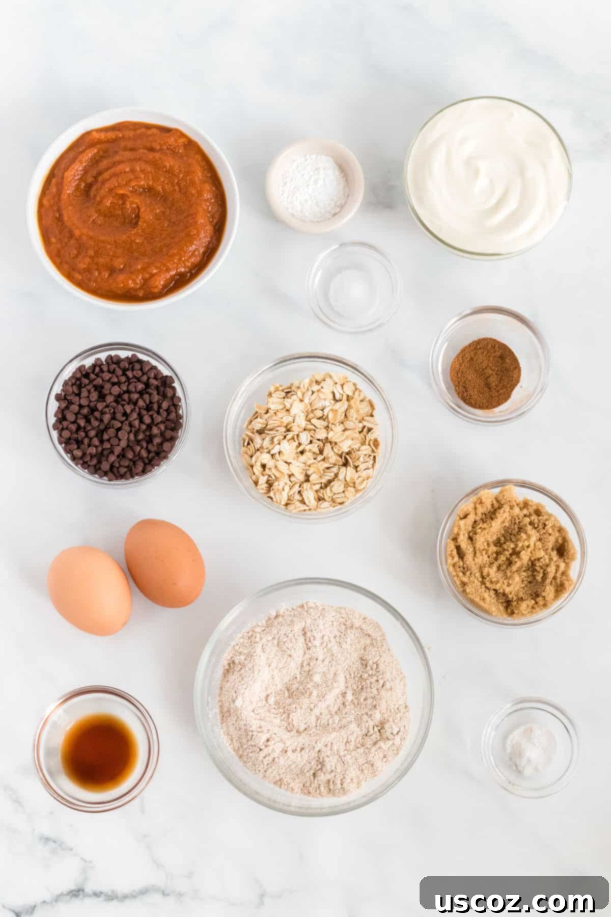 Guilt-Free Pumpkin Chocolate Chip Muffins 4 Ingredients laid out for making healthy pumpkin muffins