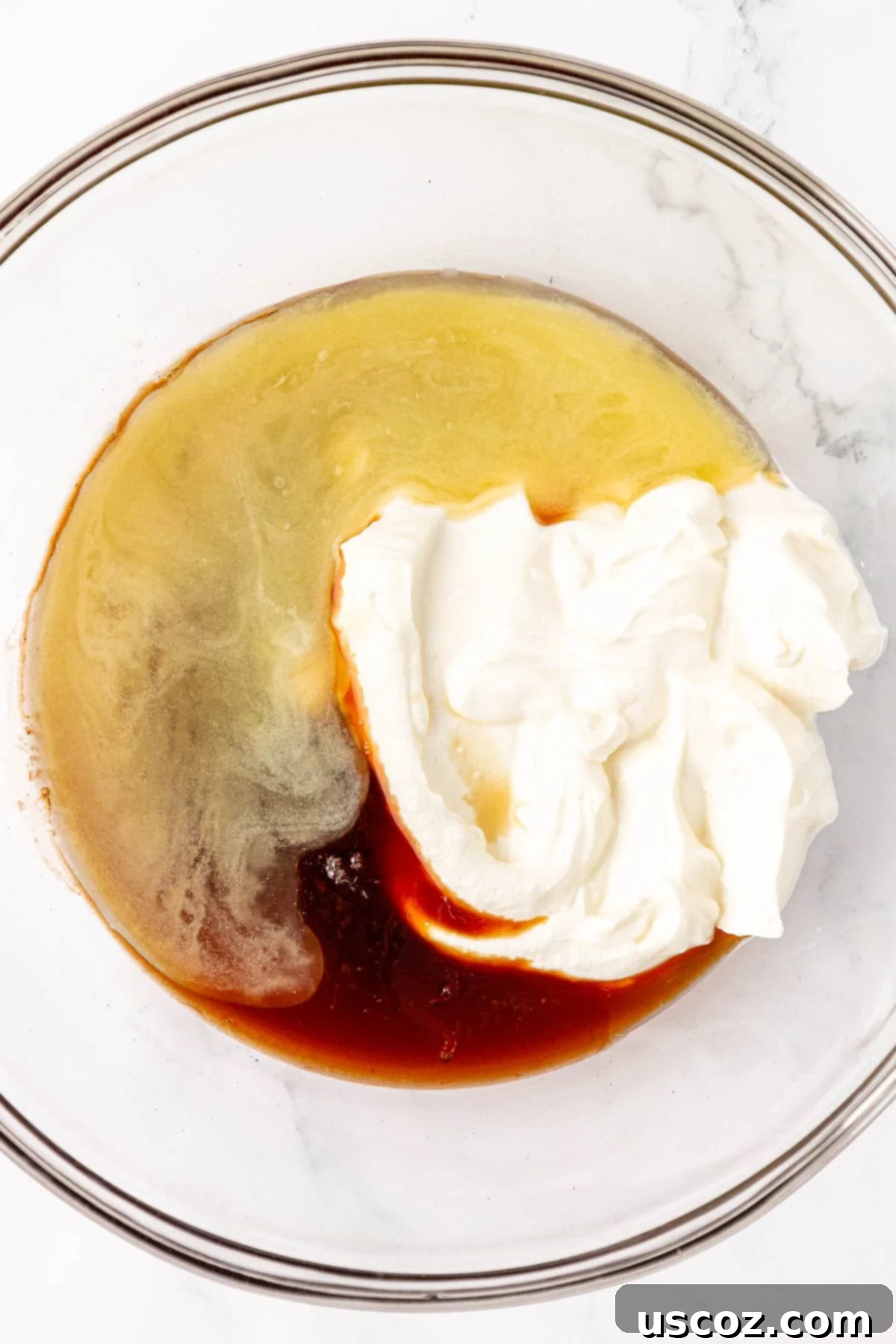 Wholesome Greek Yogurt Cake 7 wet ingredients for Greek Yogurt Snack Cake in a bowl