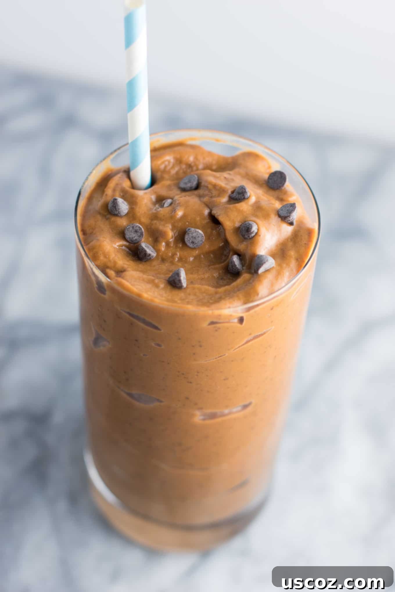 Guilt Free Chocolate Bliss 4 Healthy chocolate milkshake recipe made with just 5 ingredients. You won't believe the secret ingredient that makes it so creamy!