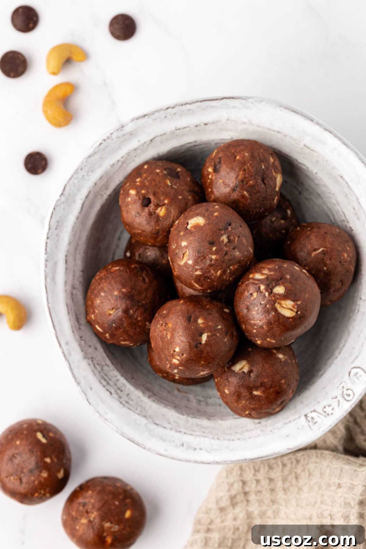 Choco-Cashew Power Bites 2 chocolate cashew energy bites in a bowl