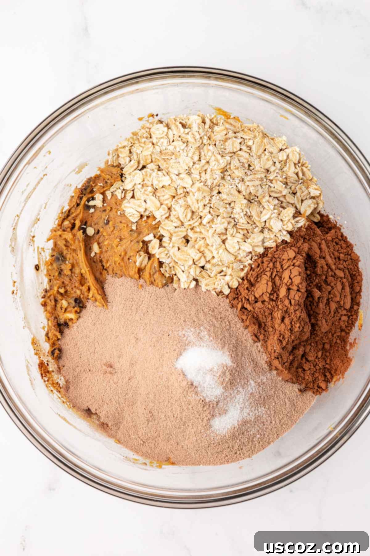 Choco-Cashew Power Bites 11 adding the rest of the energy bite ingredients