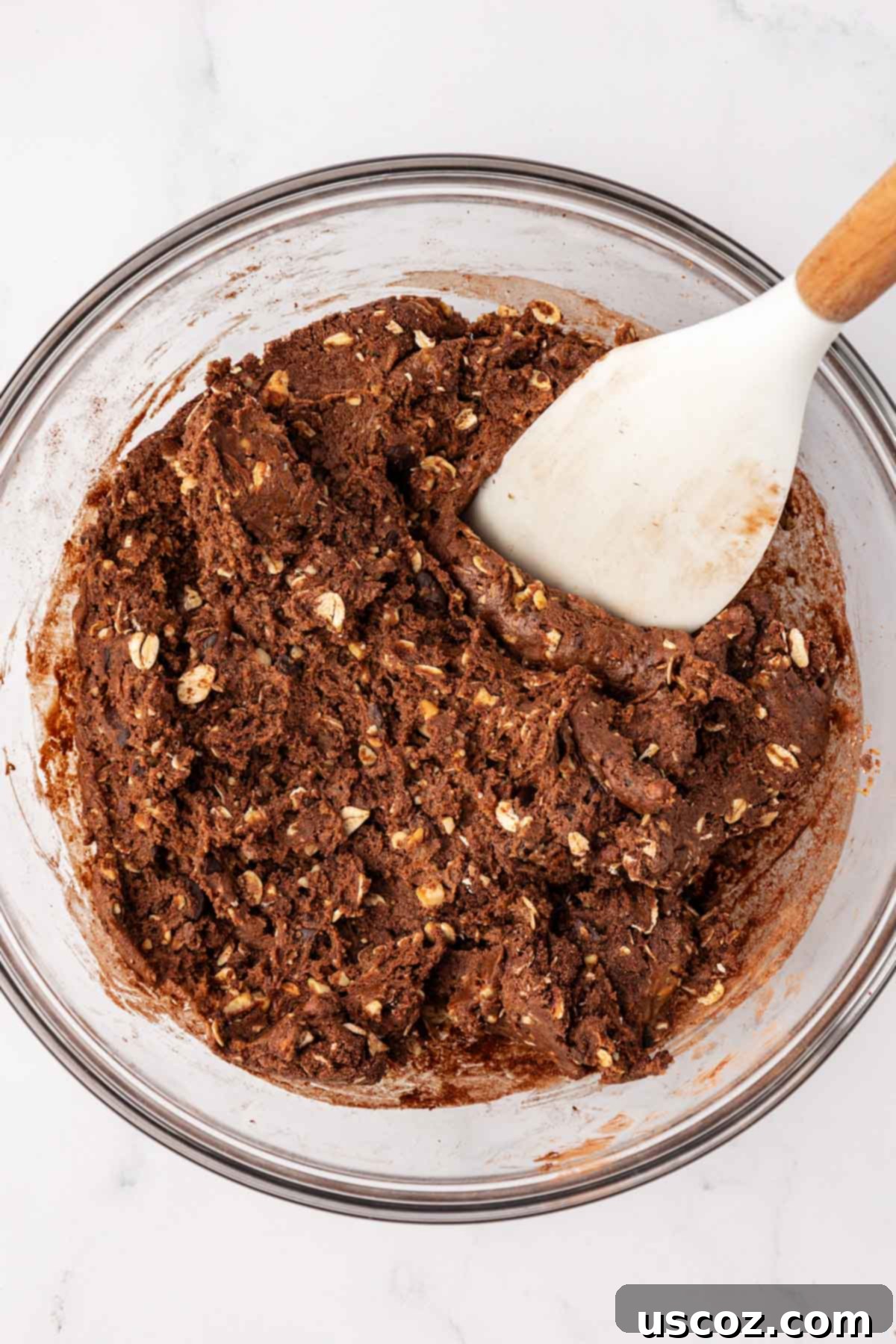 Choco-Cashew Power Bites 12 chocolate cashew energy bites batter mixed together