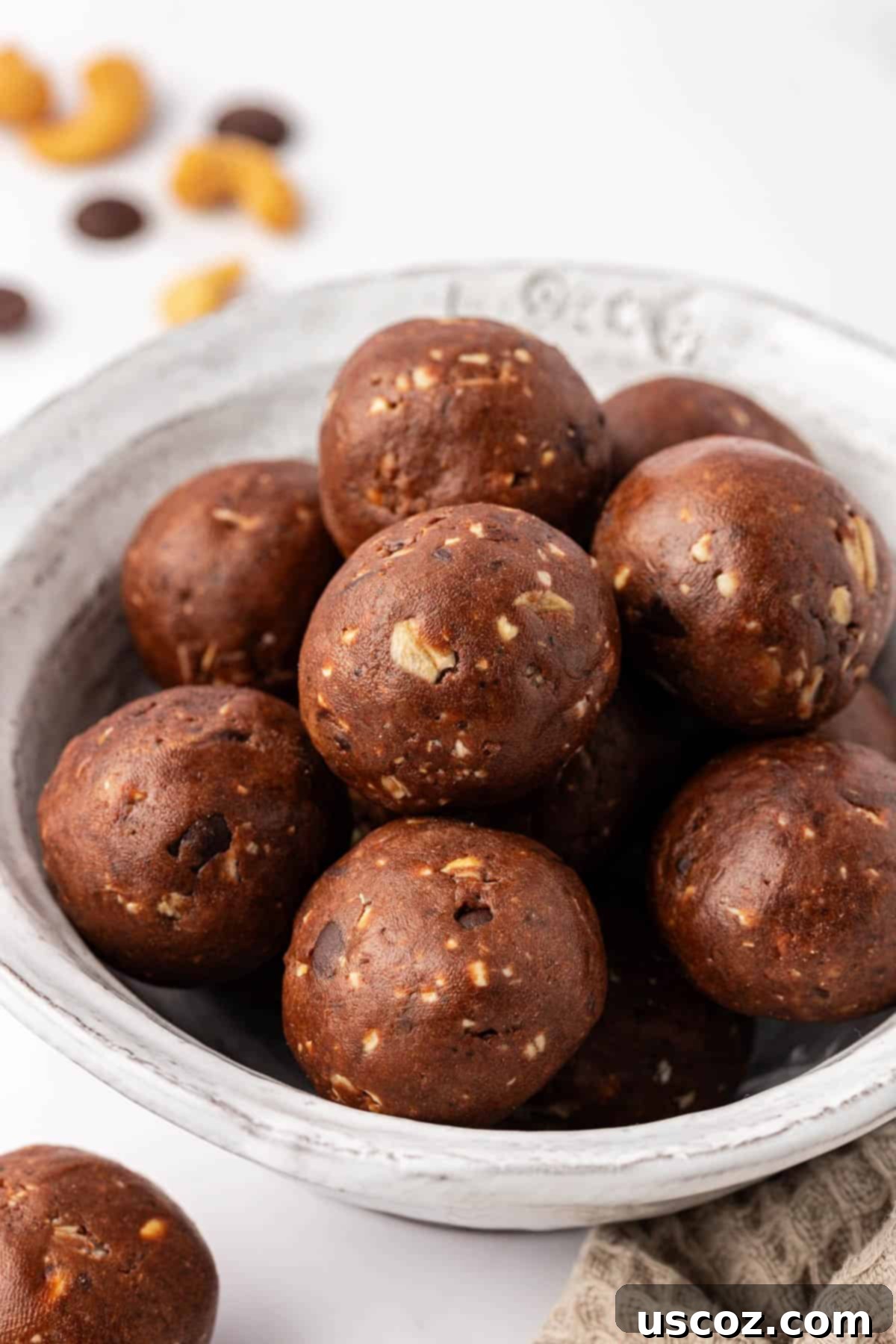 Choco-Cashew Power Bites 14 chocolate cashew energy bites in a bowl