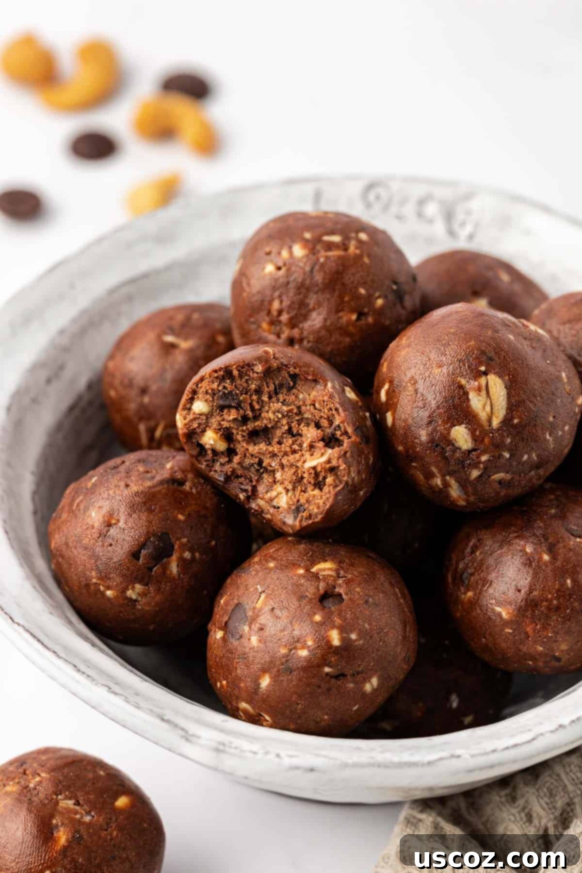 Choco-Cashew Power Bites 16 chocolate cashew energy bites in a bowl