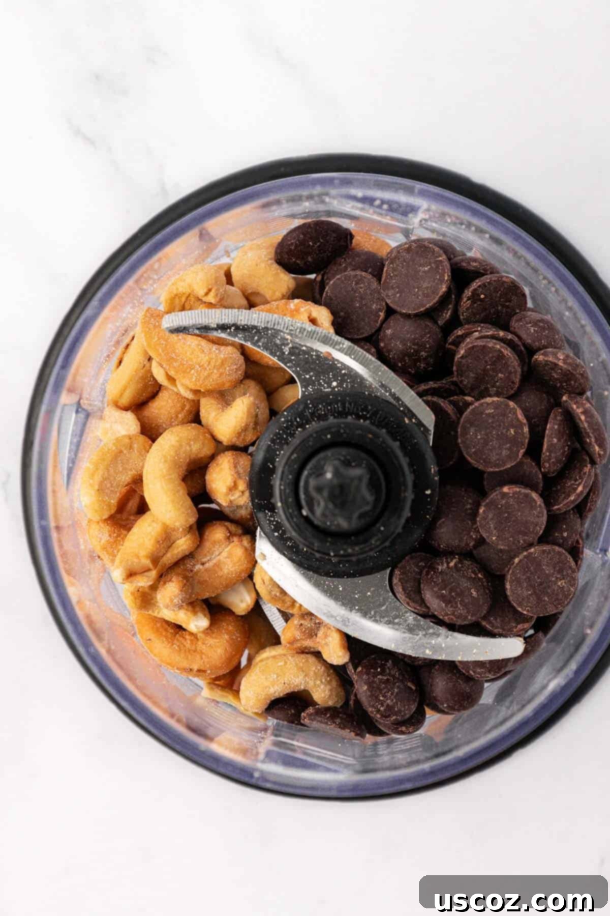 Choco-Cashew Power Bites 7 dark chocolate chips and cashews in a food processor