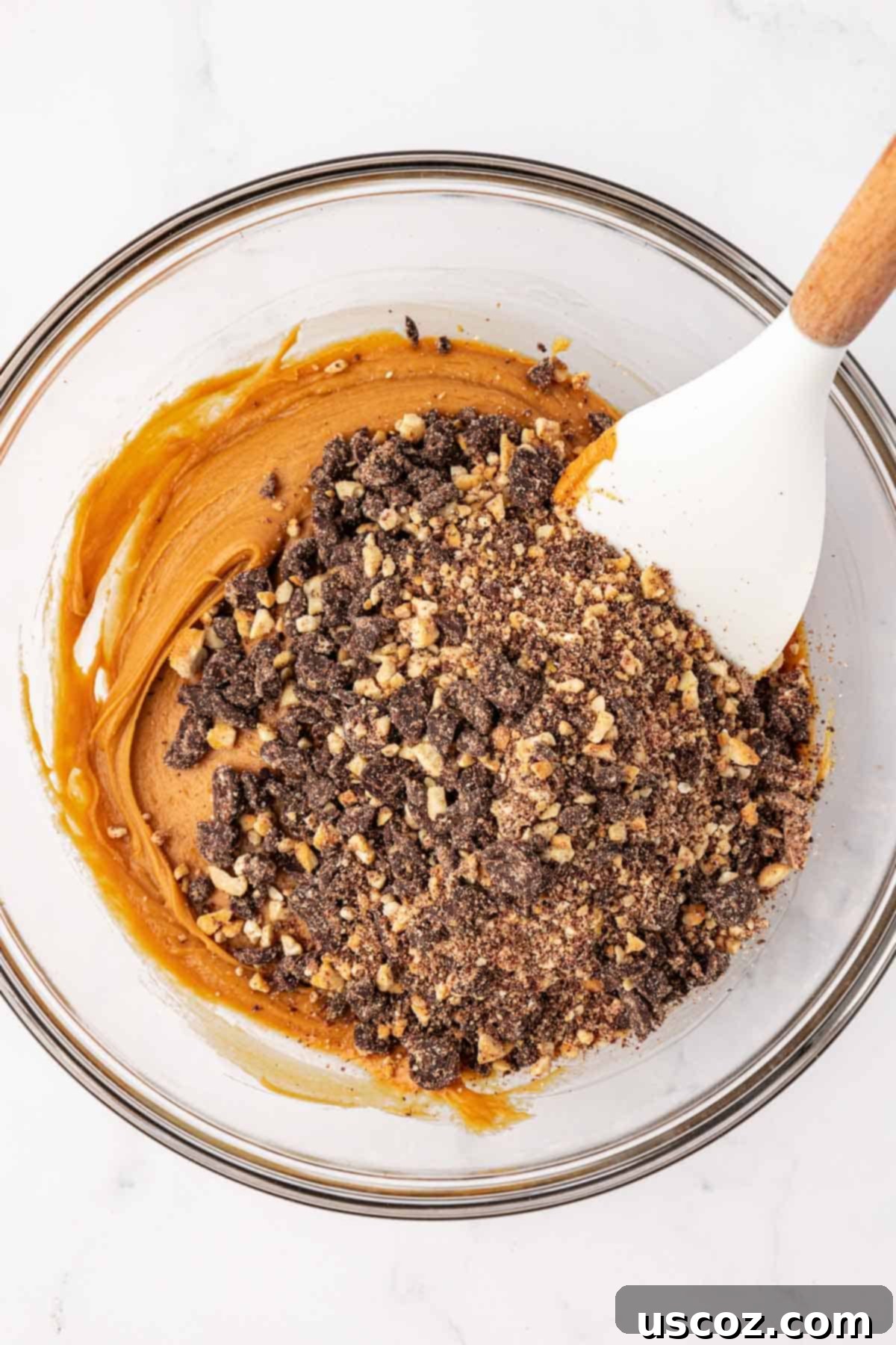 Choco-Cashew Power Bites 9 chocolate chips and cashews added to the mixing bowl