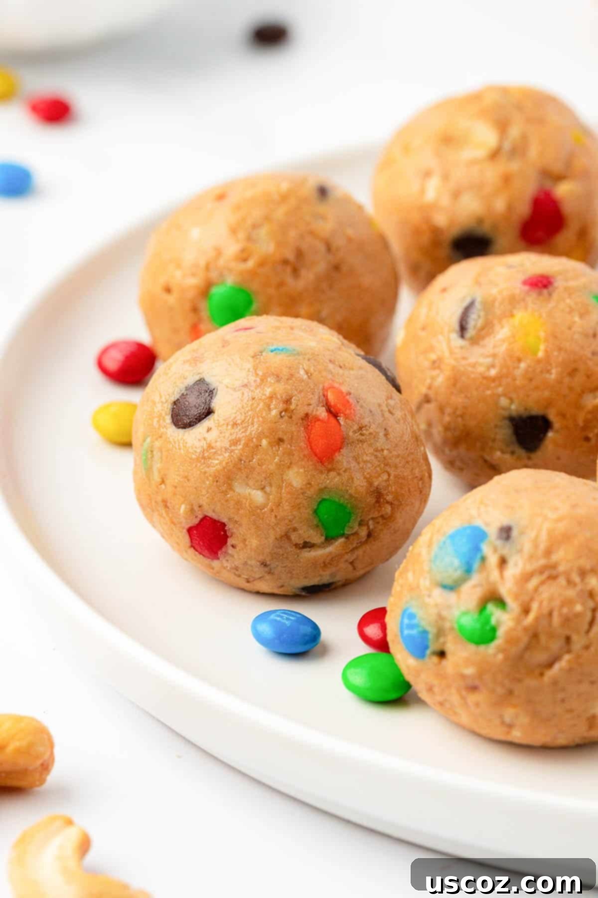 Colorful Chocolate Cashew Crunch Power Bites 3 Close-up of freshly made M&M Cashew Crunch Energy Bites