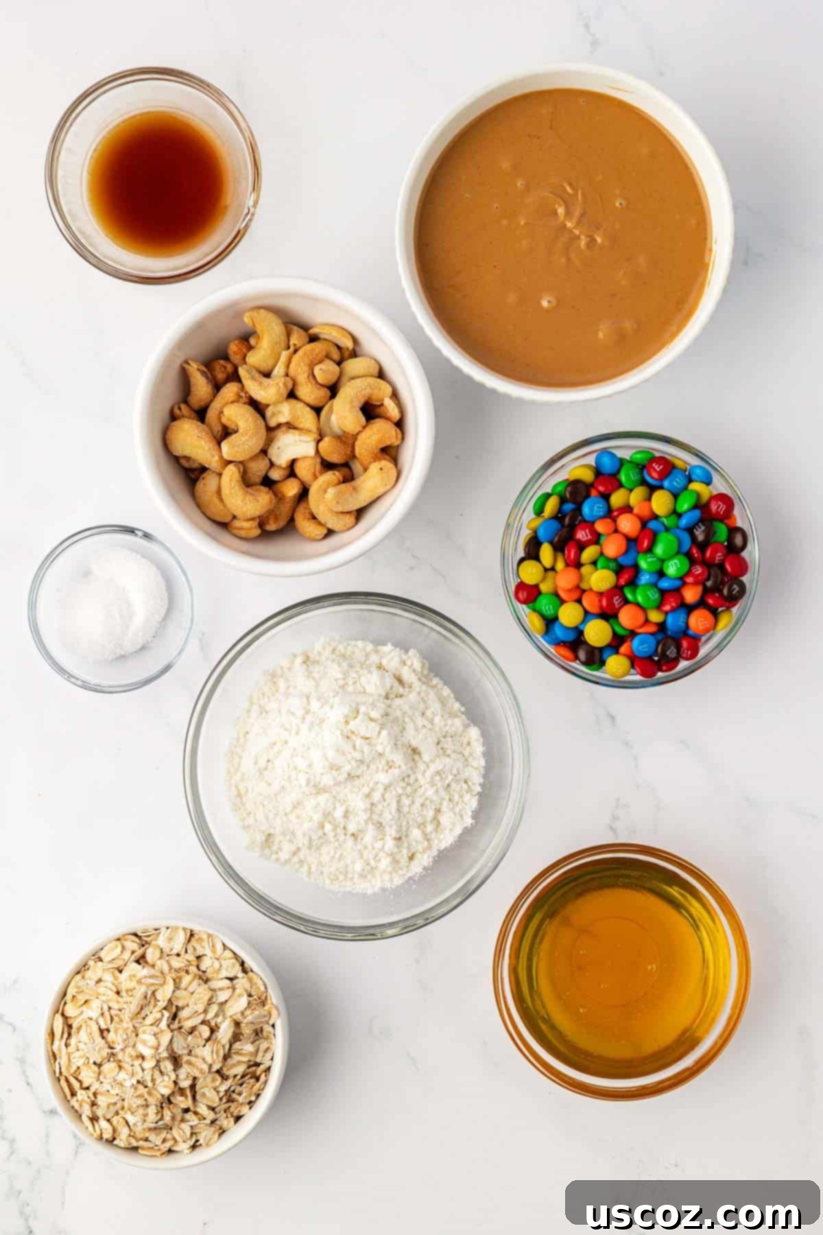 Colorful Chocolate Cashew Crunch Power Bites 4 Ingredients laid out for making M&M Cashew Crunch Energy Bites
