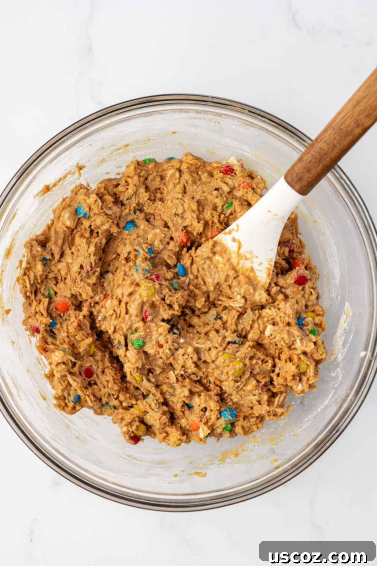 Colorful Chocolate Cashew Crunch Power Bites 6 Mixed energy bite batter in a bowl, showing thick consistency