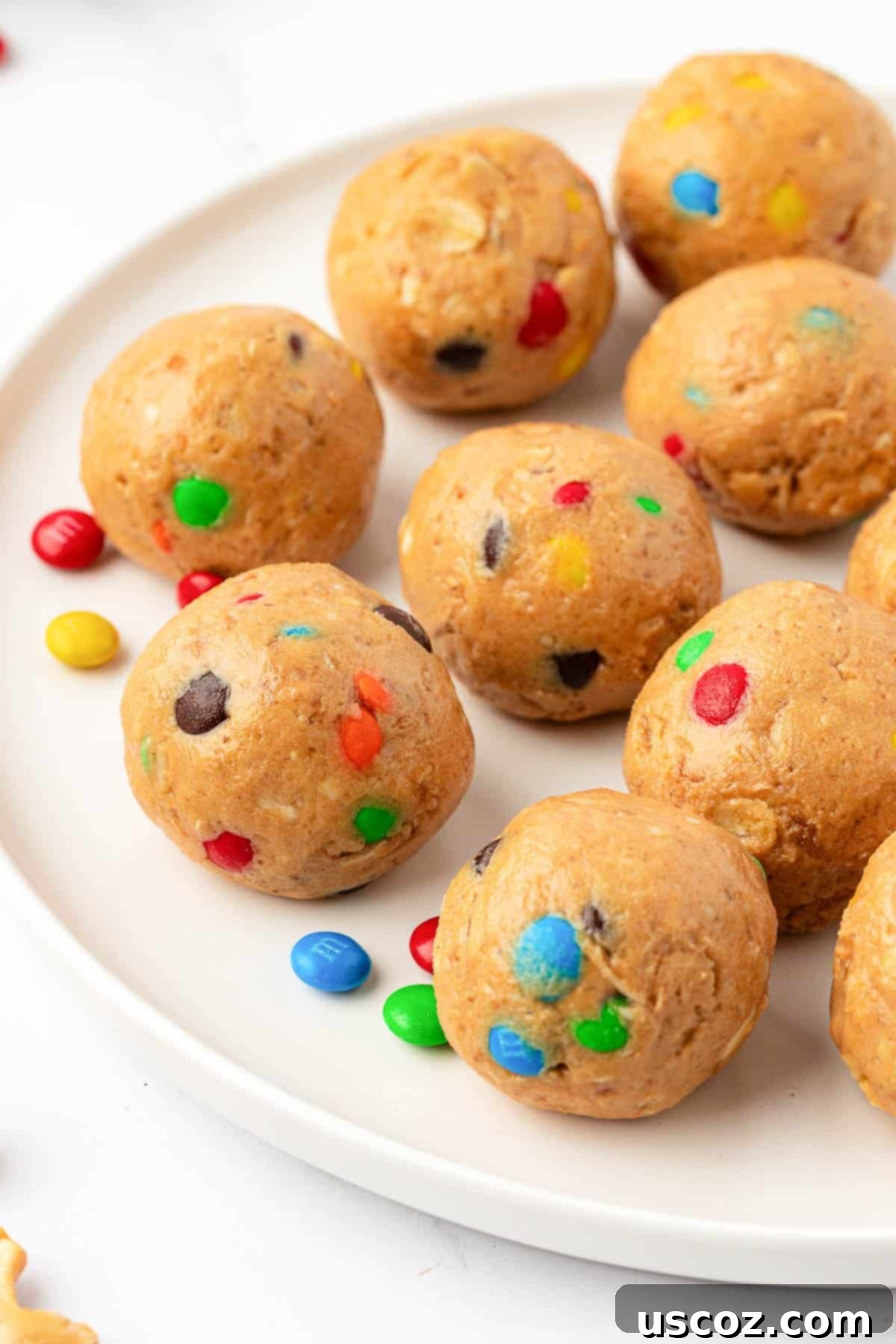 Colorful Chocolate Cashew Crunch Power Bites 9 Assortment of M&M Cashew Crunch Energy Bites in a bowl