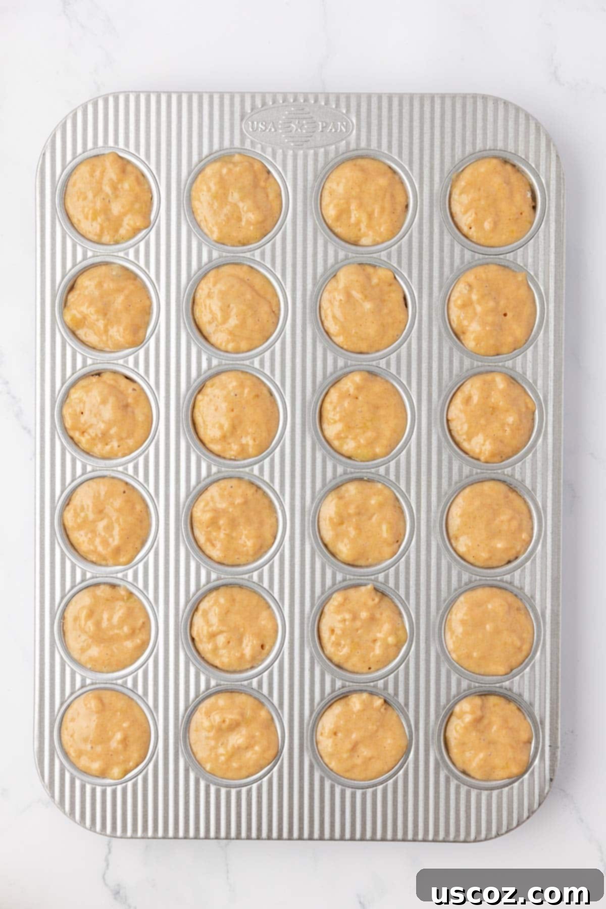 Protein-Rich Banana Muffin Bites 16 mini muffin tin filled with batter