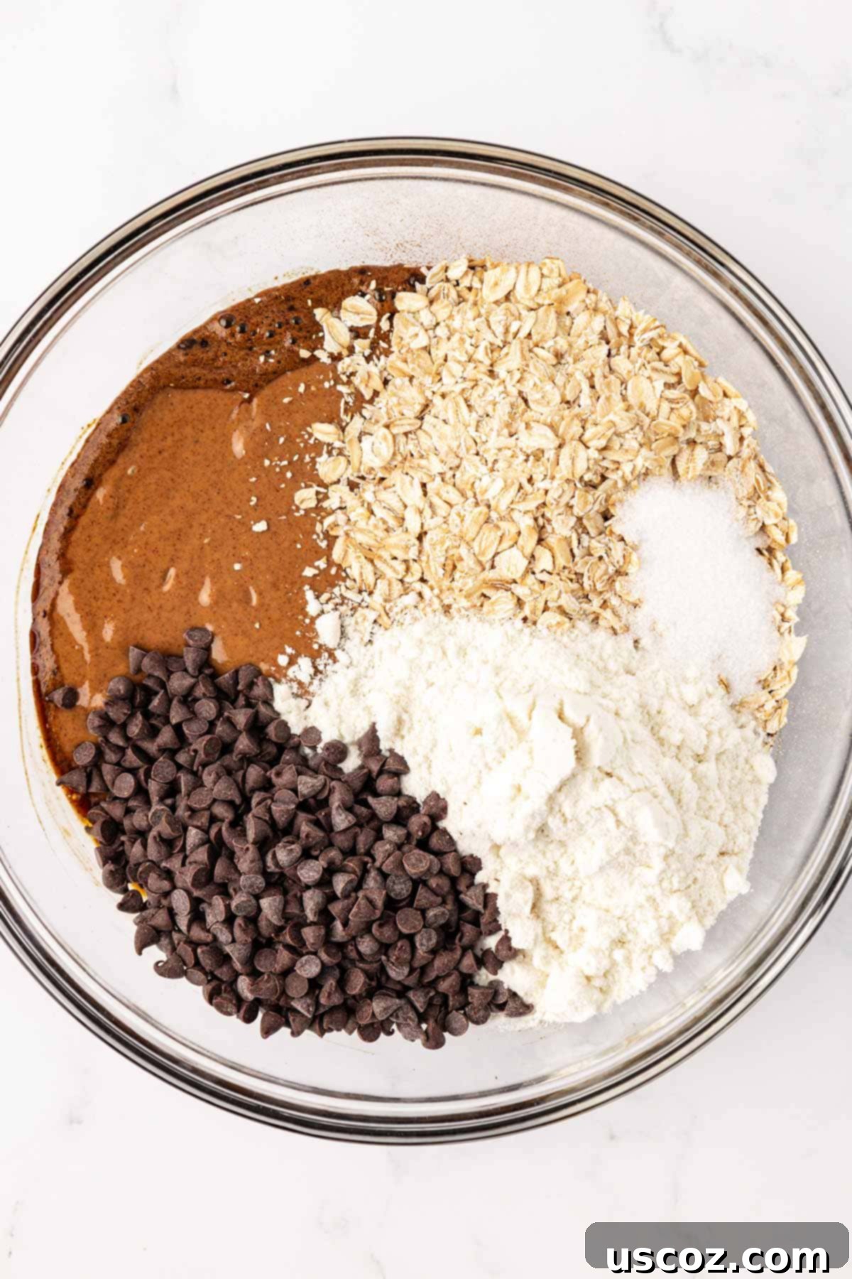 Espresso Boost Bites 7 All ingredients for espresso energy bites in a mixing bowl before being combined