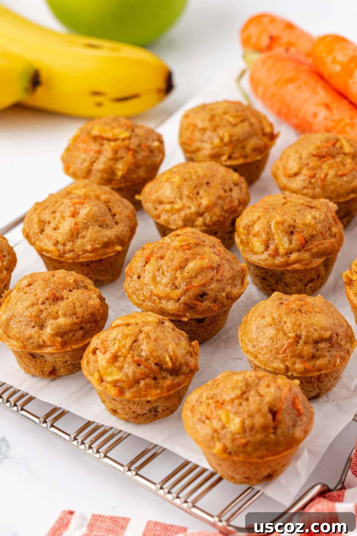 Alphabet Mini Muffins 17 ABC mini muffins cooling on a wire rack