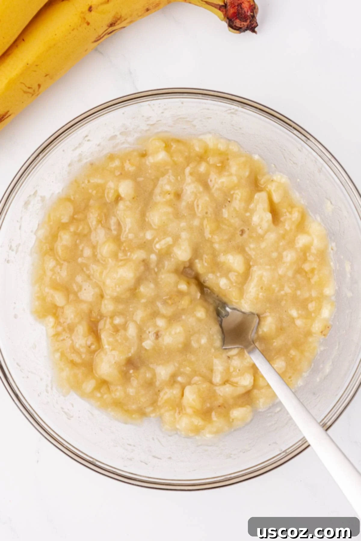 Luscious Greek Yogurt Banana Bread 7 mashed banana in a mixing bowl