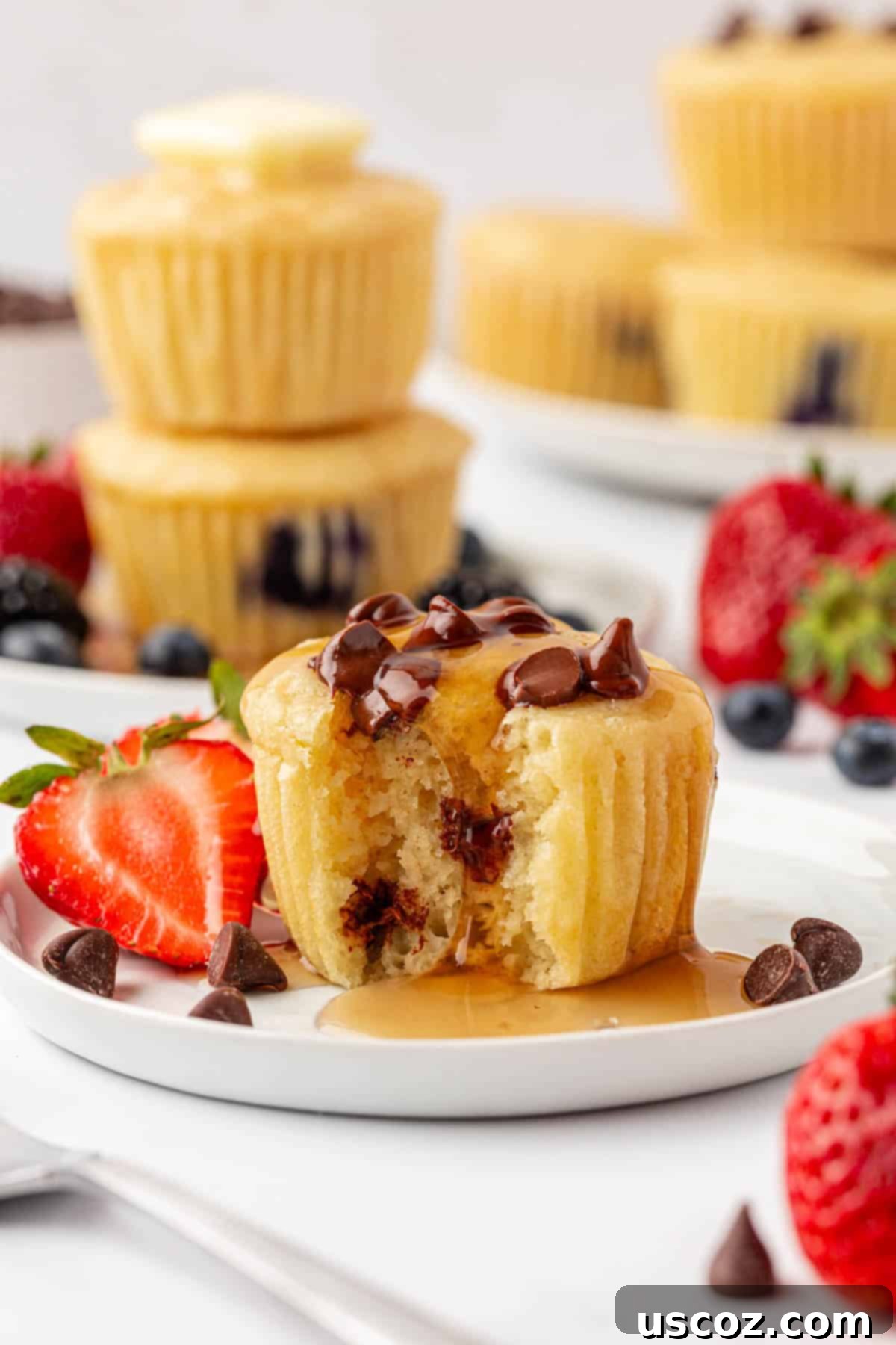 Fluffy Pancake Puffs 17 pancake muffin with syrup dripping over it