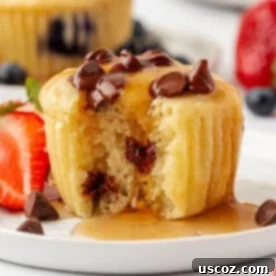 Fluffy Pancake Puffs 18 pancake muffin with syrup dripping over it