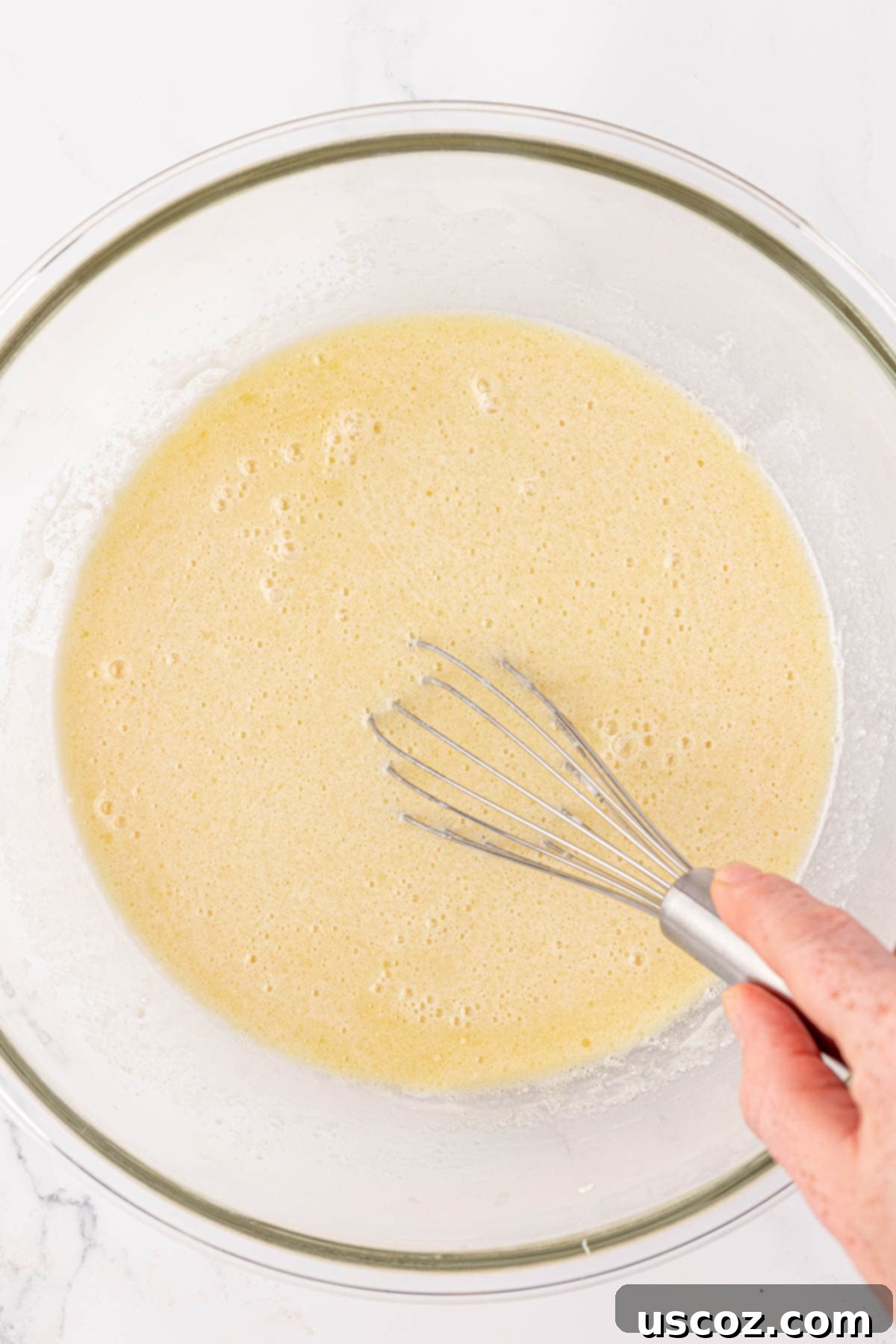 Fluffy Pancake Puffs 8 whisking the wet ingredients together