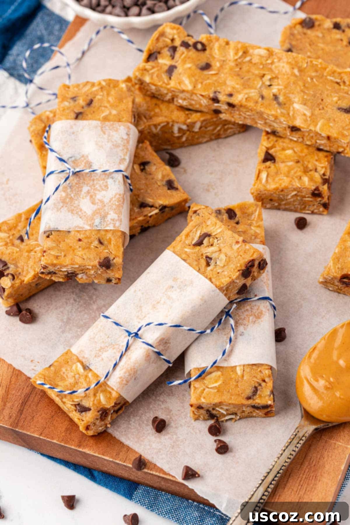 Power-Packed Protein Granola Bars 12 Stack of several homemade protein granola bars with a rustic background