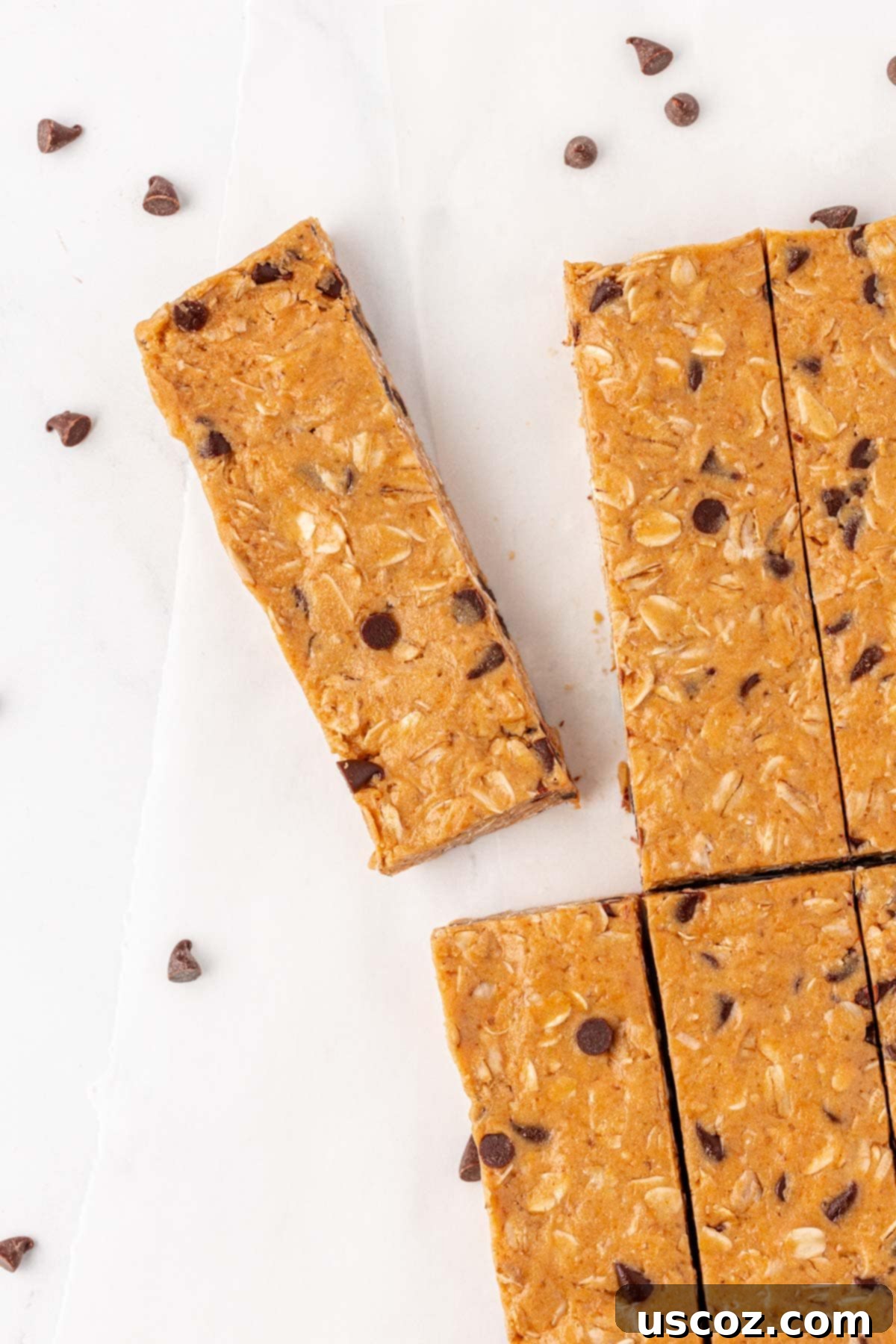 Power-Packed Protein Granola Bars 15 Assorted homemade protein granola bars on a tray with a patterned napkin