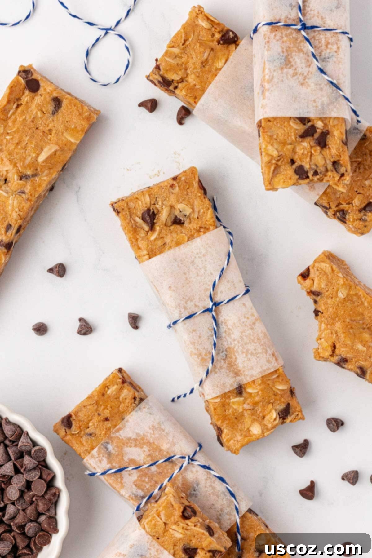 Power-Packed Protein Granola Bars 3 Close-up view of a homemade protein granola bar showing its chewy texture and chocolate chips