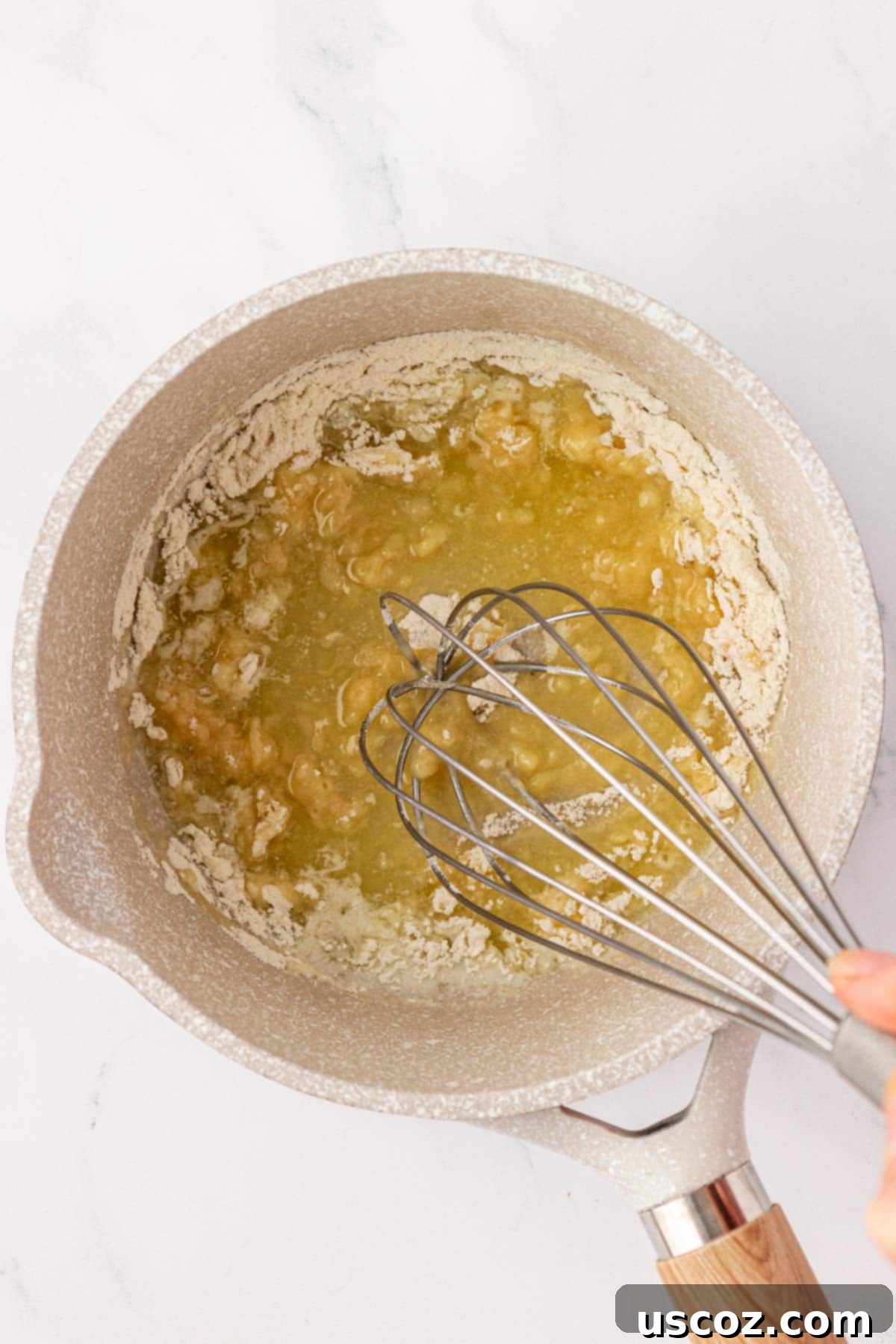 whisking together the butter and flour