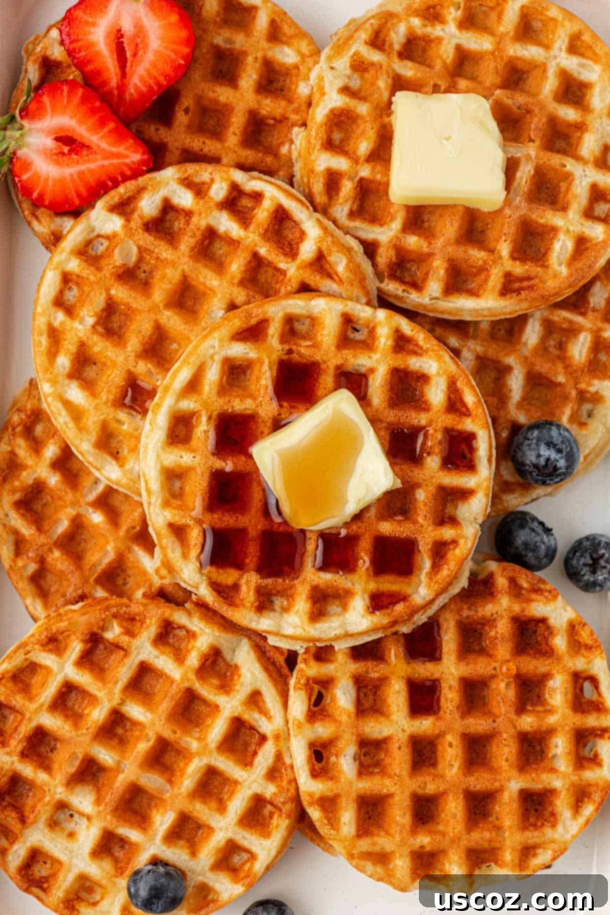 Close-up of golden Greek yogurt waffles, perfectly cooked and ready to serve.