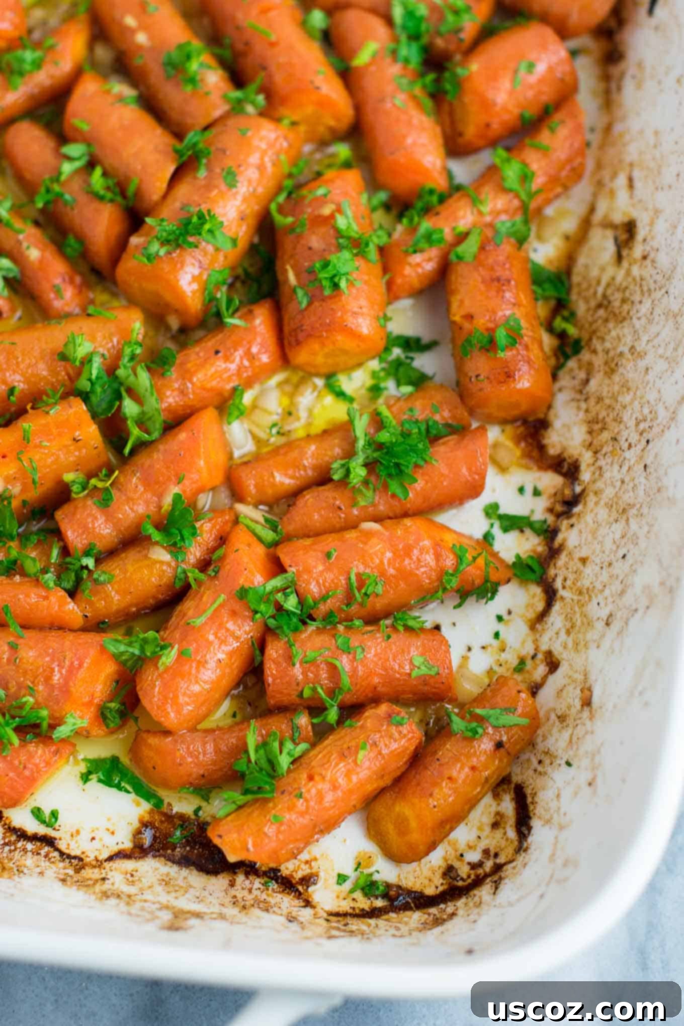 Mouthwatering Garlic Butter Roasted Carrots 7 Garlic butter roasted carrots recipe with fresh parsley. A delicious vegan friendly side dish recipe that will disappear in minutes! #vegan #roastedcarrots #garlicbutter #garlicbuttercarrots #sidedishes #vegetables