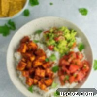 Effortless Enchilada Tofu Burrito Bowls 10 Easy enchilada tofu burrito bowls with homemade guacamole and salsa. Bring chipotle to your kitchen with this delicious recipe! #vegan #burritobowls #tofuburritobowls