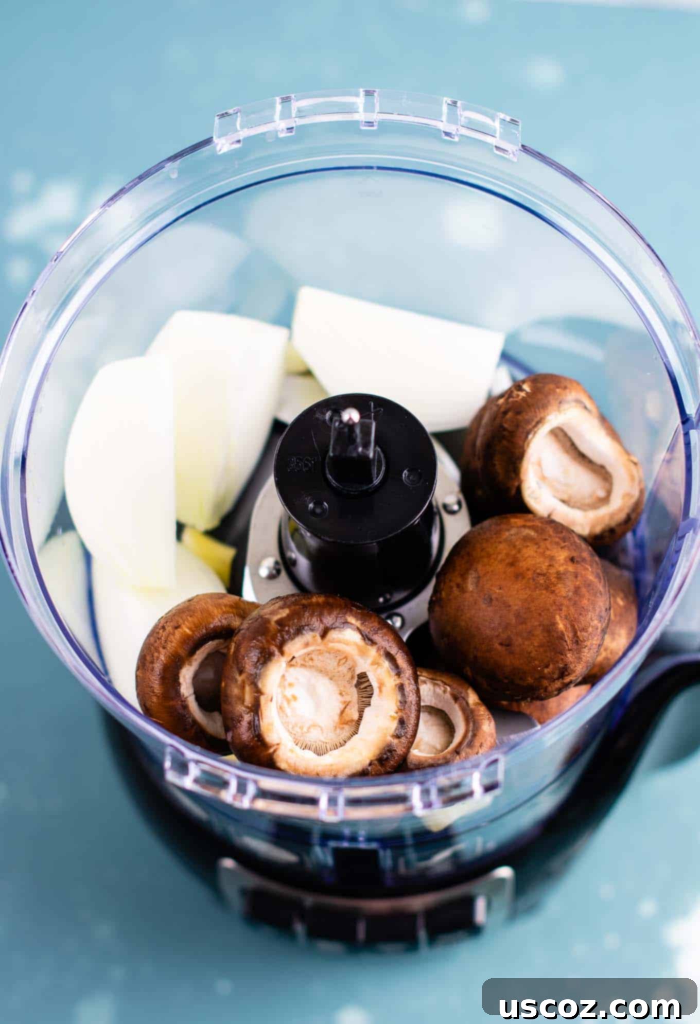 Easy One-Pot Lasagna Soup 3 Mushrooms, garlic, and onion being processed into a fine mince for the lasagna soup base