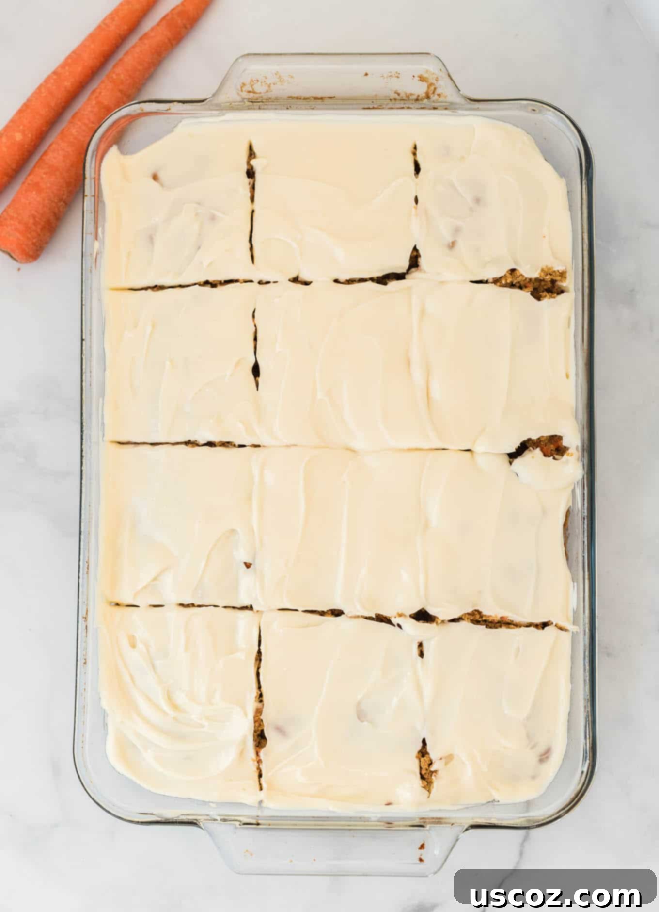 Gluten-Free Carrot Cake Perfection 5 Gluten-free carrot cake, beautifully frosted and precisely sliced into 12 perfect pieces, ready to be served.