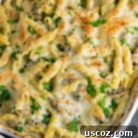 Creamy Mushroom & Cauliflower Alfredo Pasta Bake 13 Mushroom cauliflower alfredo pasta bake recipe. A deliciously indulgent pasta bake lightened up with a homemade creamy cauliflower sauce. #caulifloweralfredo #vegetarian #pasta #dinner