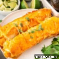 Southwestern Sweet Potato Black Bean Enchiladas 18 Sweet Potato Black Bean Enchiladas served on a plate with fresh toppings