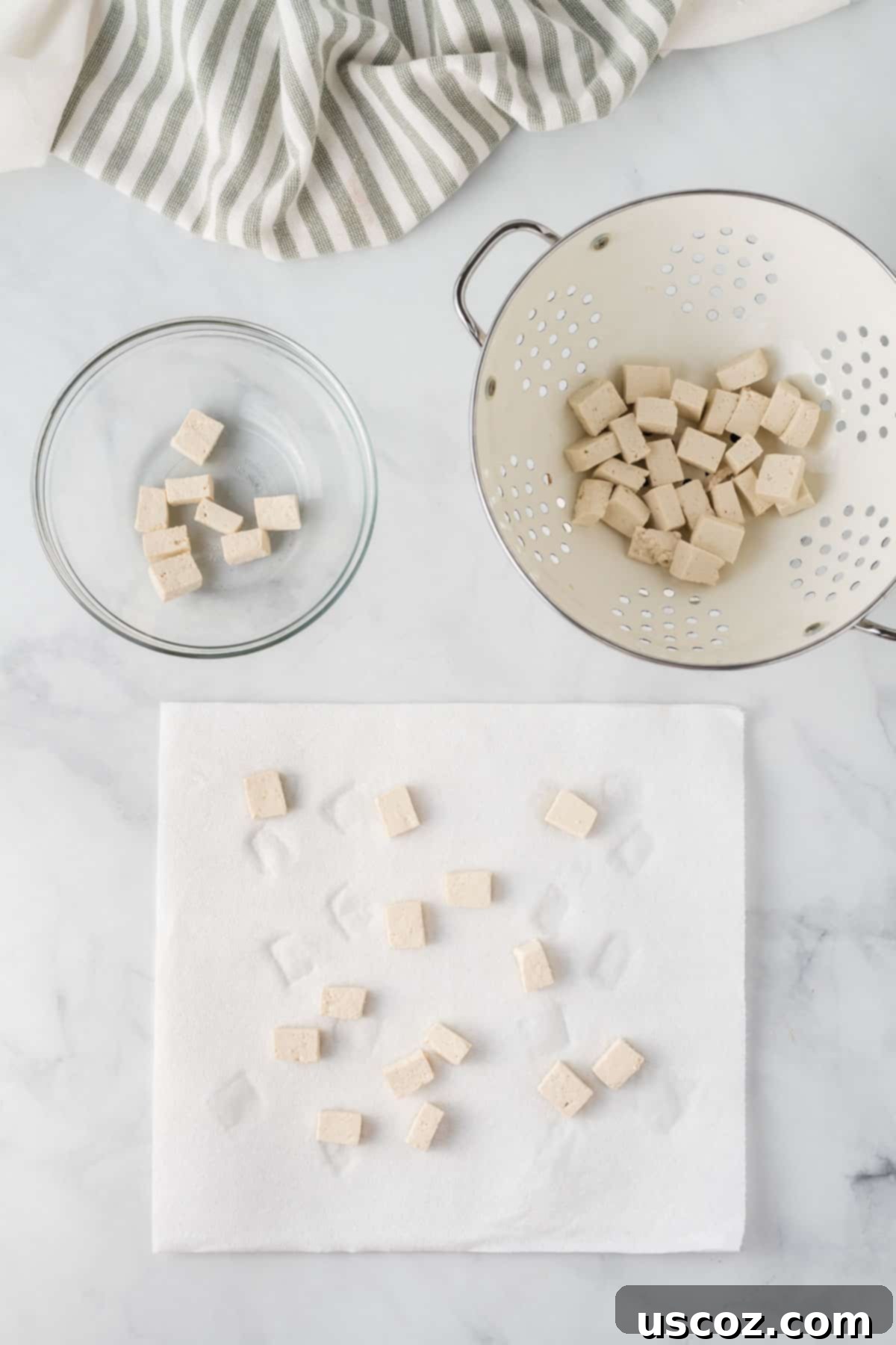 Flavorful Tofu and Broccoli Stir-Fry 5 cubed tofu drying on a paper towel
