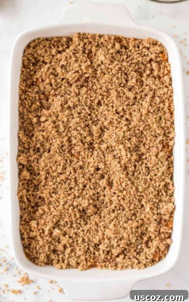 Ultimate Gluten Free Sweet Potato Casserole 15 pecan topping added over the sweet potatoes