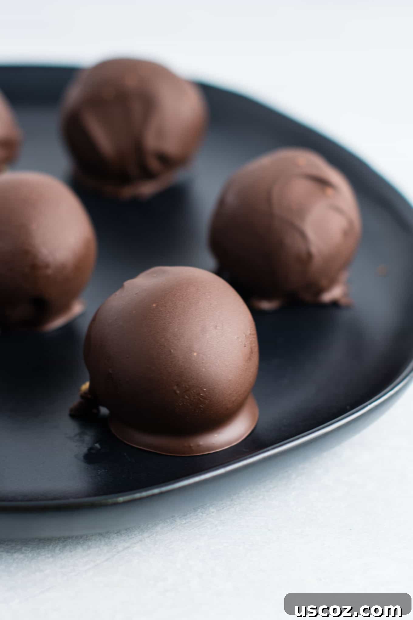 Decadent Yet Healthy No-Bake Peanut Butter Truffles 3 Close-up of the smooth and creamy peanut butter truffle filling before rolling, showing its rich texture.
