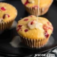 Wholesome Cranberry Orange Muffins 11 Healthy Cranberry Orange Muffins recipe with Greek yogurt and whole wheat pastry flour, topped with orange glaze.