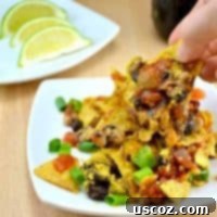 Plant-Powered Taco Bake 4 A serving of the delicious vegan taco casserole, garnished with fresh toppings