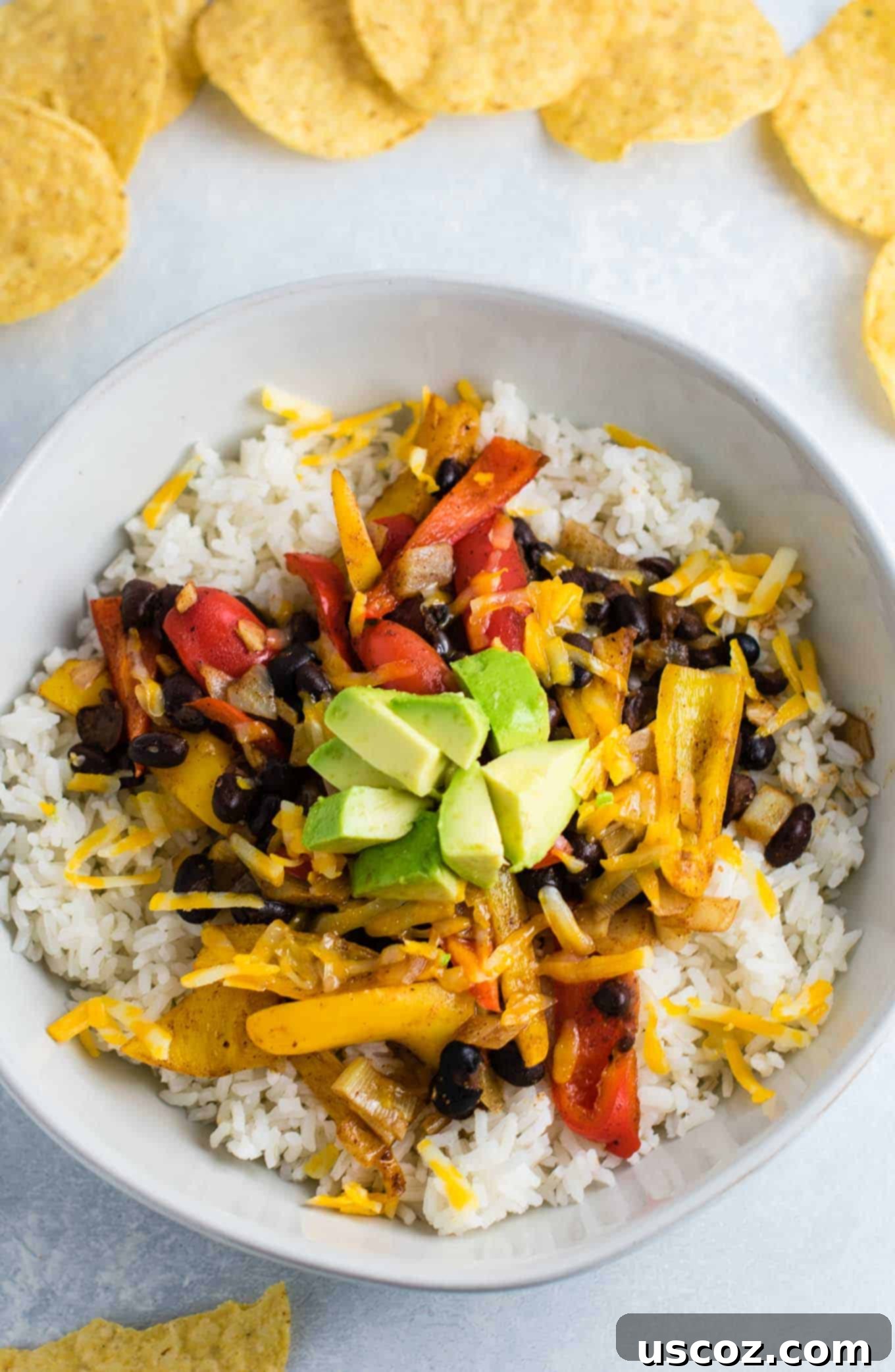 Easy Vegetarian Burrito Bowl 2 Vegetarian burrito bowl recipe with black beans, mini bell peppers, garlic, and onion. Better than chipotle! An easy vegetarian meal prep recipe or dinner the whole family will love! #vegetarianmealprep #vegetarianburritobowl #dinner #healthy #vegetarian