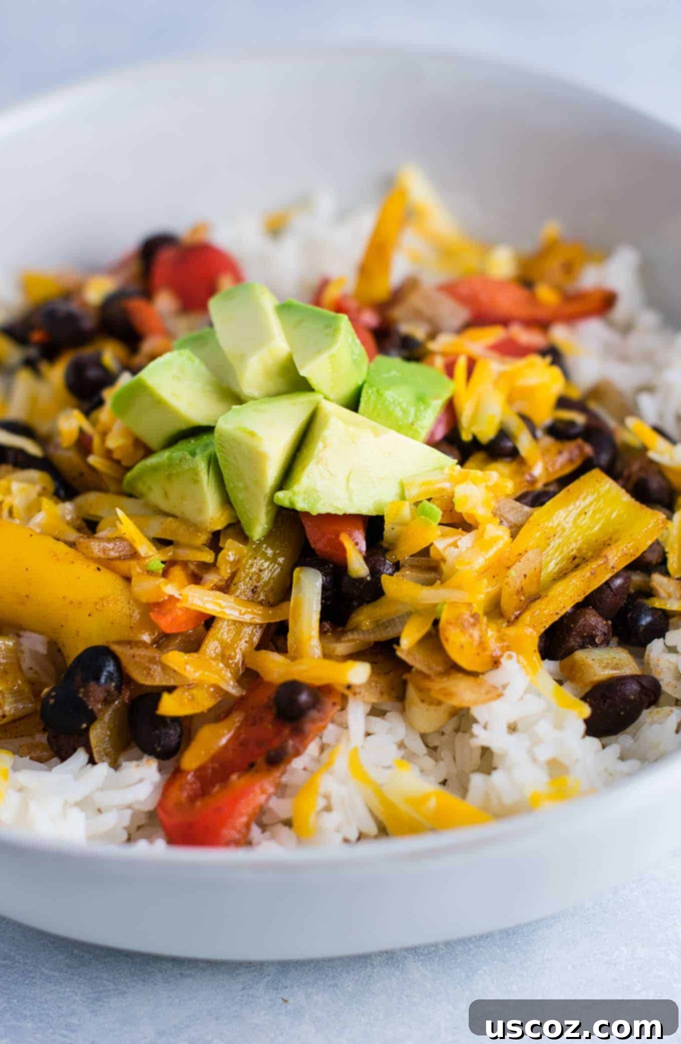 Easy Vegetarian Burrito Bowl 4 Vegetarian burrito bowl recipe with black beans, mini bell peppers, garlic, and onion. Better than chipotle! An easy vegetarian meal prep recipe or dinner the whole family will love! #vegetarianmealprep #vegetarianburritobowl #dinner #healthy #vegetarian