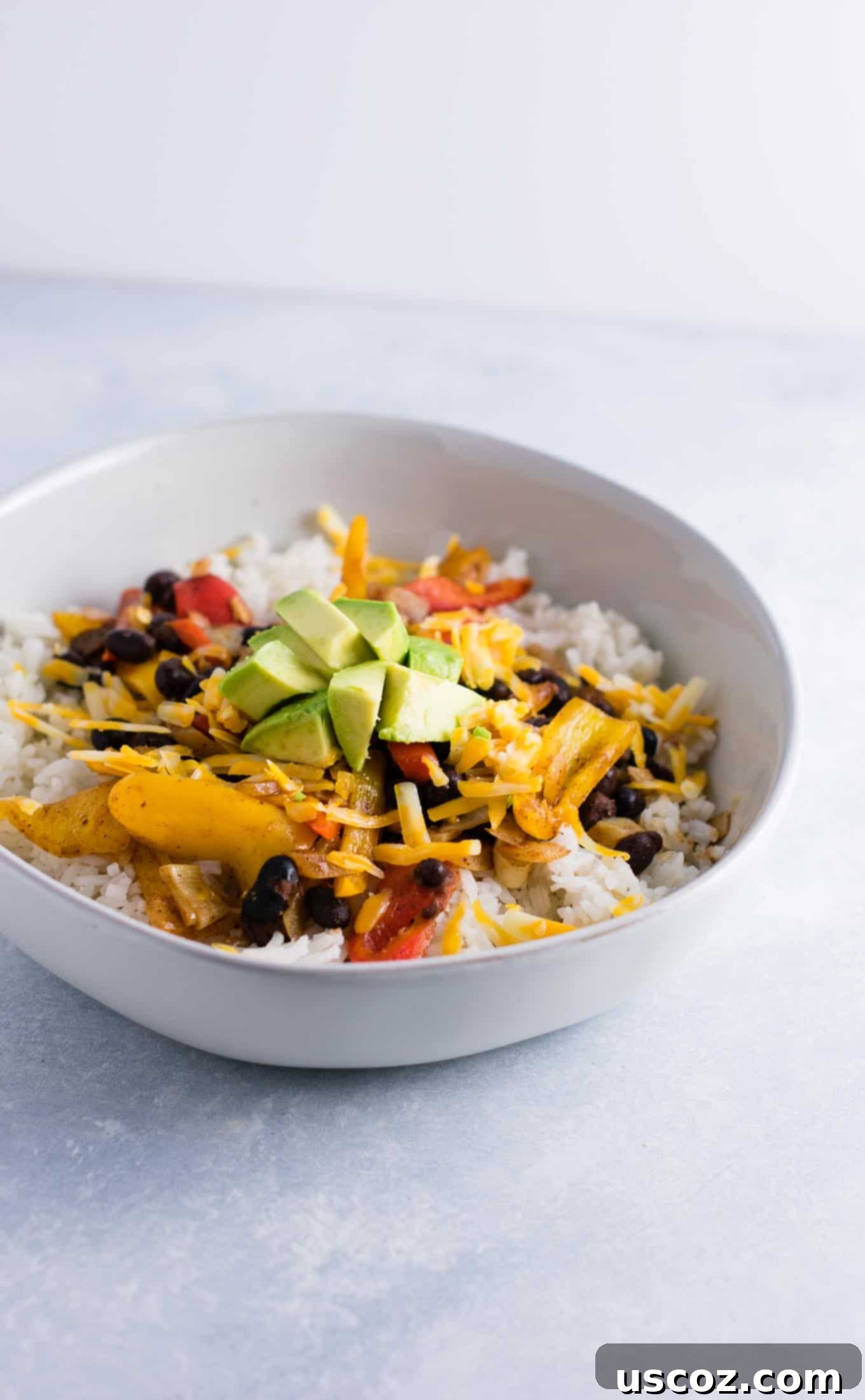 Easy Vegetarian Burrito Bowl 5 Vegetarian burrito bowl recipe with black beans, mini bell peppers, garlic, and onion. Better than chipotle! An easy vegetarian meal prep recipe or dinner the whole family will love! #vegetarianmealprep #vegetarianburritobowl #dinner #healthy #vegetarian