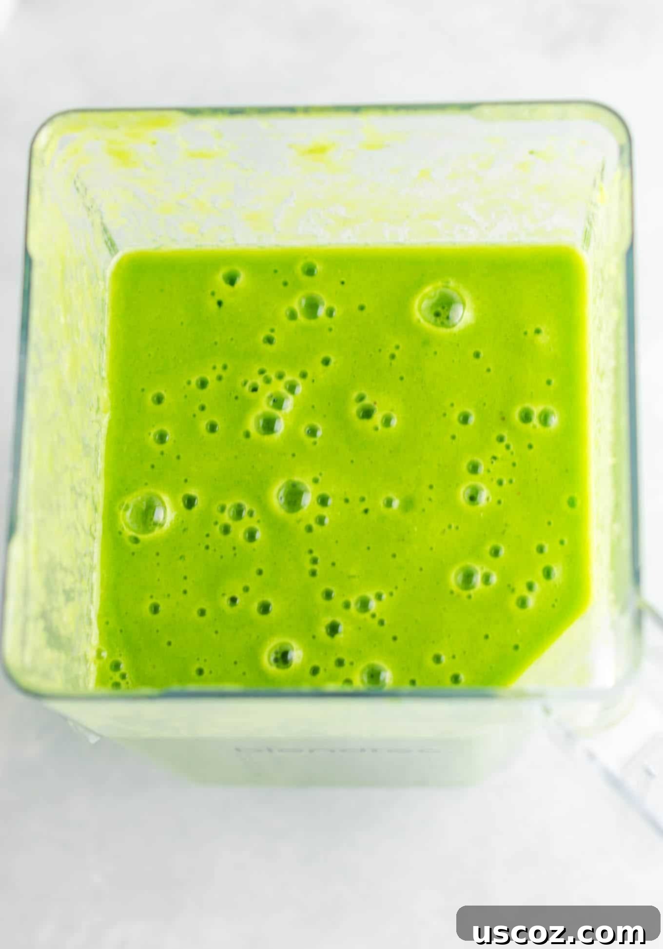 Vibrant Citrus Kale Green Smoothie 6 green smoothie in the blender