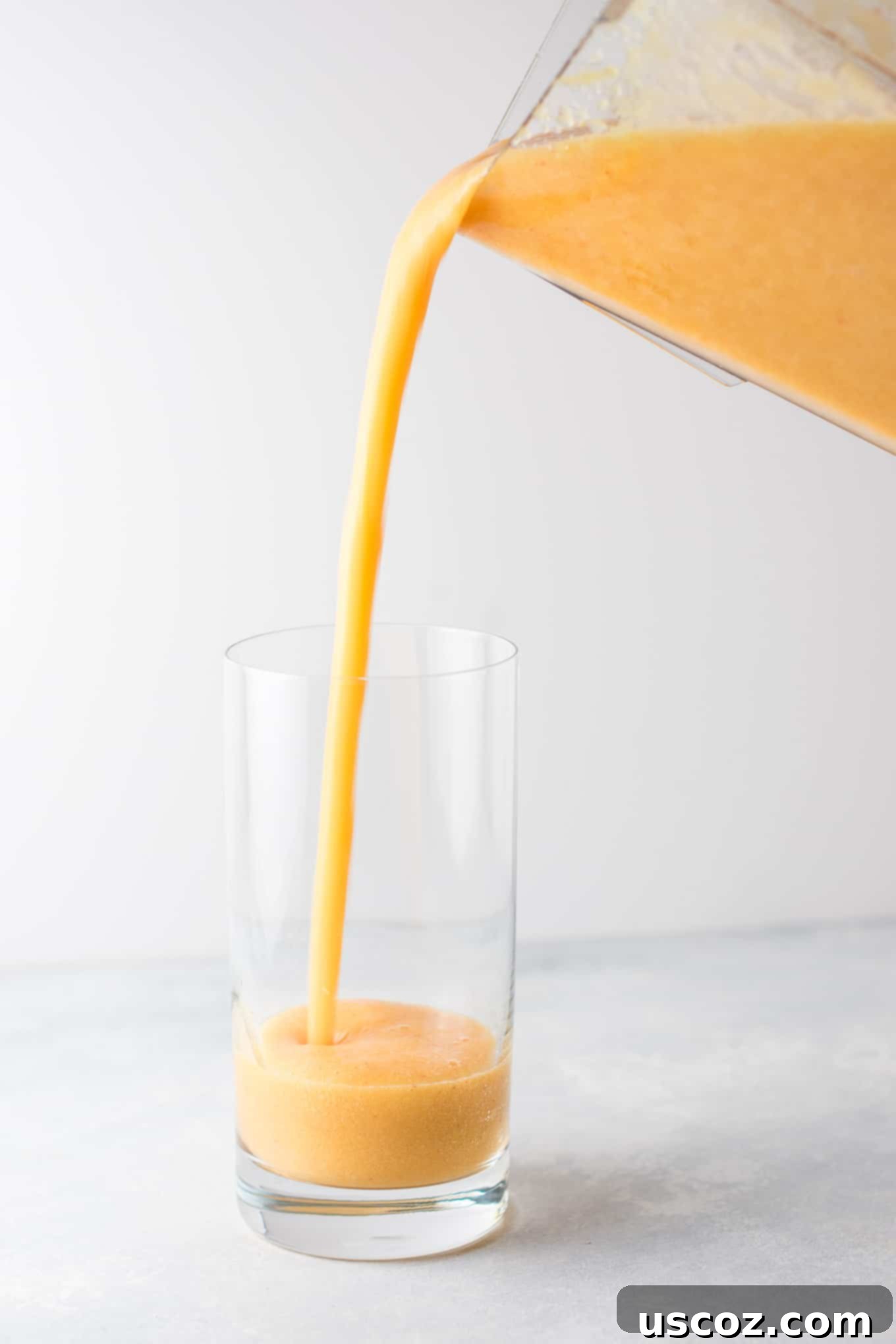 Refreshing Ginger Peach Detox Smoothie recipe with fresh cucumber and lemon. This vibrant, naturally vegan smoothie is packed with healthy ingredients, perfect for detoxification and daily wellness. #healthysmoothie #detoxsmoothie #gingerpeachsmoothie #vegan #smoothierecipes